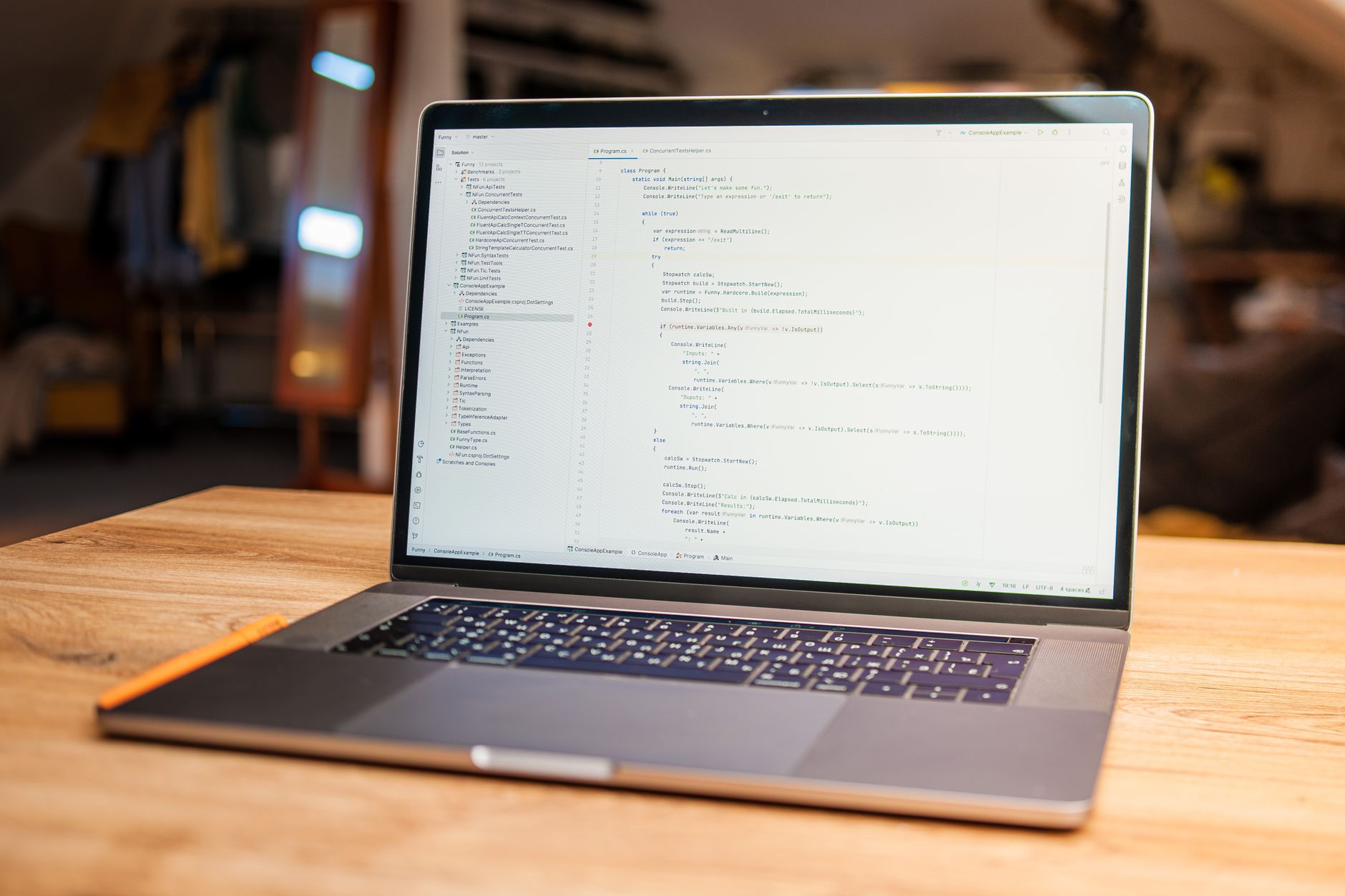 Open laptop showing code on a desk