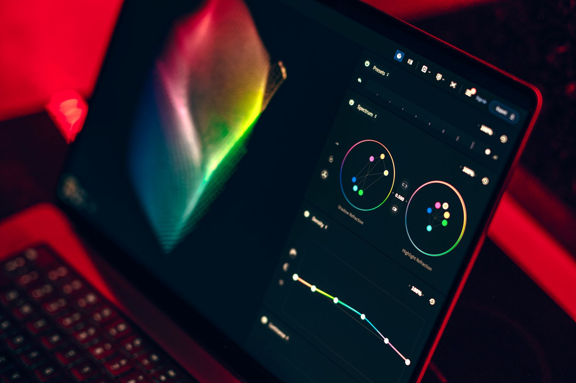 Laptop screen showing a colorful design dashboard